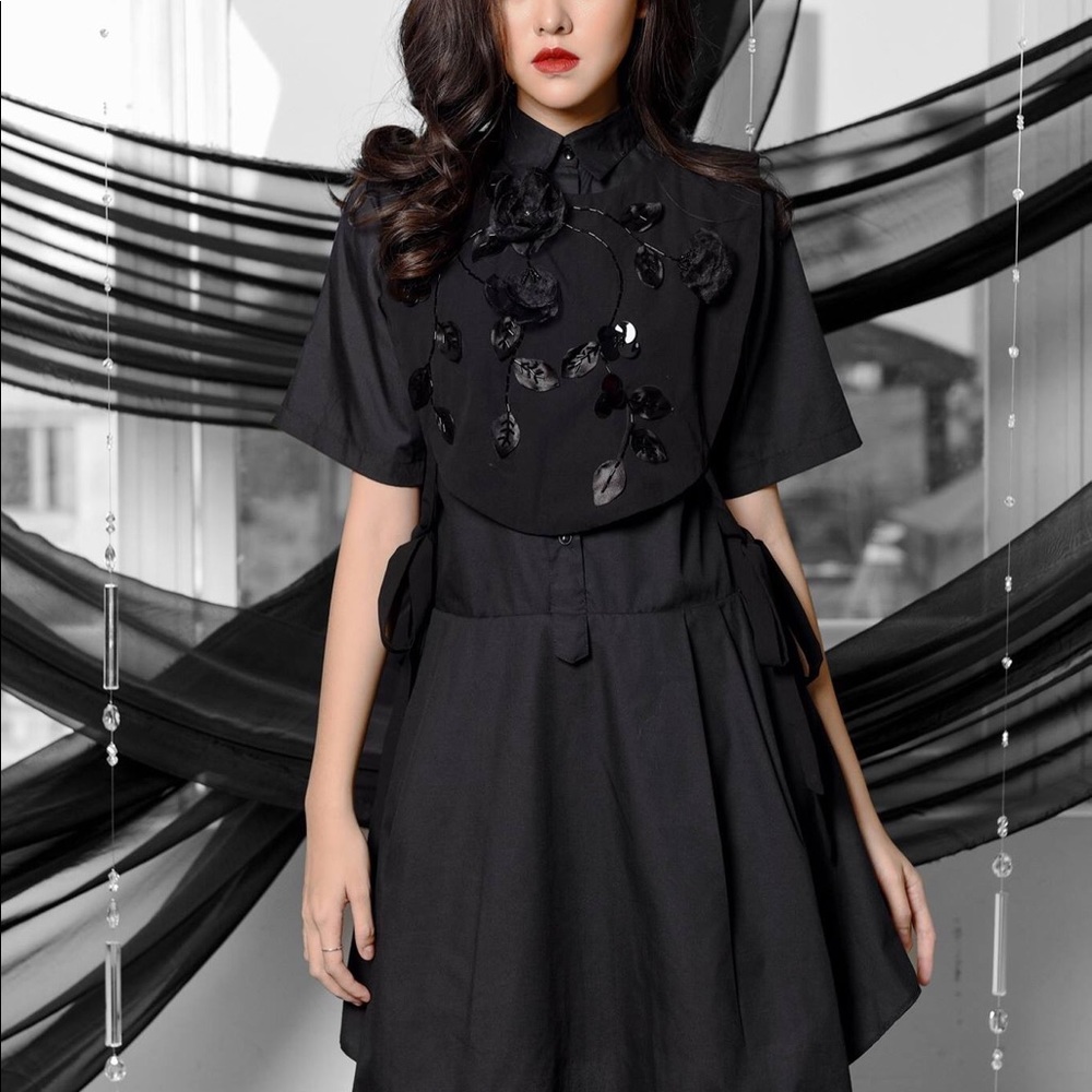 Black shirt dress with floral apron